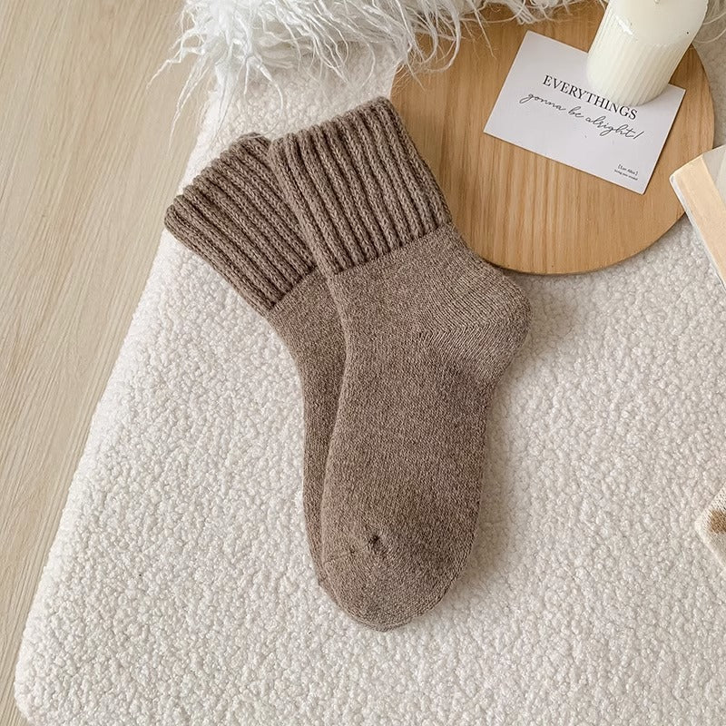 A pair of Taupe Hushwoven socks with a fold-over ribbed cuff