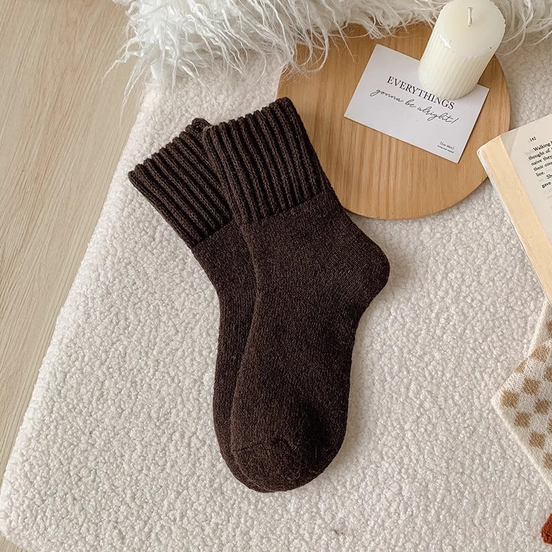 A pair of Brown Hushwoven socks with a fold-over ribbed cuff