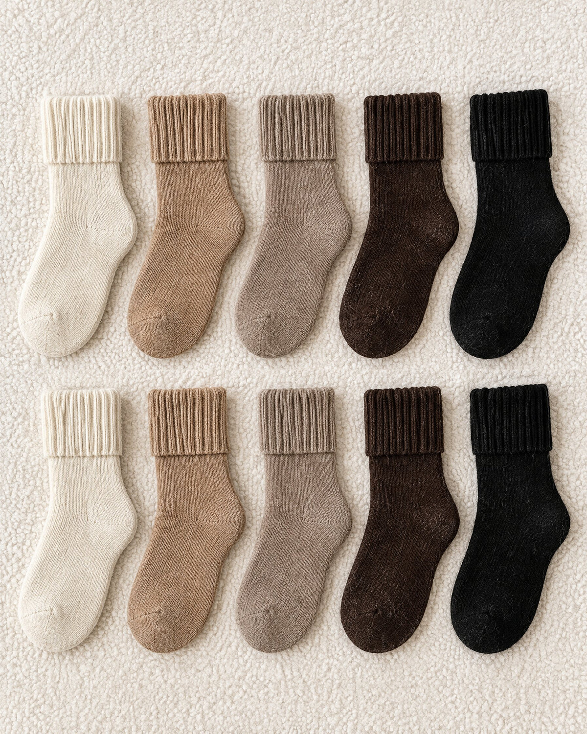 The 10-pair mixed set: two rows of socks in cream, beige, taupe, brown and black